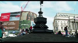 crowds at the eros statue, picadilly circus, london