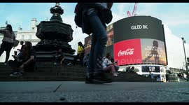 crowds at the eros statue, picadilly circus, london