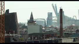barcelona skyline shot from a high vantage point looking towards the industrial port
