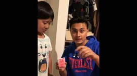 Kids react to card trick
