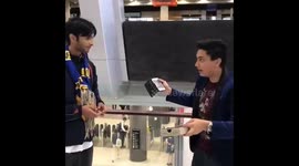 Magician throws phone of balcony prank on strangers