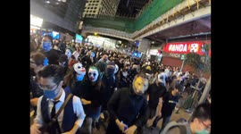 Halloween in Hong Kong is a monster mash-up of protesters in costume and riot police firing tear gas