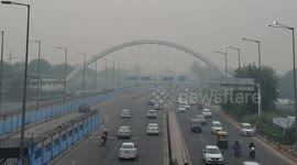 Indian government issues masks to schoolchildren as New Delhi chokes on thick smog