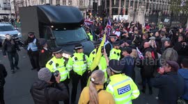 Pro-Brexit protesters block Lib Dem campaign bus in Westminster on day UK was due to leave EU
