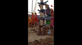 Vietnamese men complete challenge climbing on knives barefoot