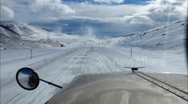 Icy highway filmed on truck dashcam near Butte, Montana