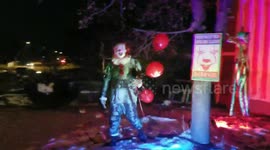 An outrageous decorated house with It Clown