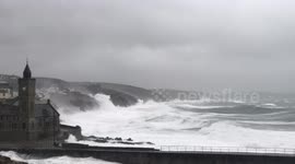 Hurricane force winds and huge waves batter Cornwall