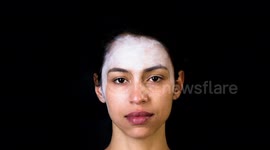 timelapse of woman having dia de los muertos, day of the dead skull makeup put on