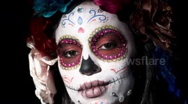 woman with dia de los muertos, day of the dead skull makeup