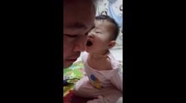 Adorable moments of toddler sending flying kiss and kissing his dad