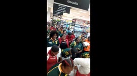 South African supermarket staff dance to celebrate victory over England