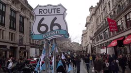 Regent Street Motor Show visitors enjoy cars display to The Blues Brothers music - Route 66 to dancing electric TESLA