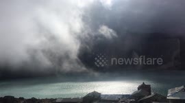 Magical fog covering lake Gokyo Ri in the highest Himalayas