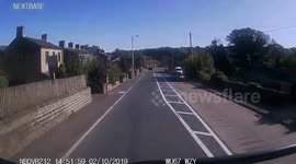 Car overtaking needlessly in a 30 mph close to central refuge