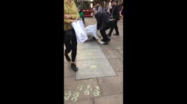 Female thief tackled and restrained on Oxford Street, London