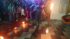 Wedding Performer Controls Fire Metal Tools