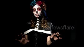 Timelapse shows woman decorating her face for Dia de los Muertos