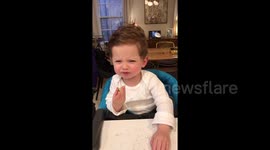 Baby eats sour lime and reacts