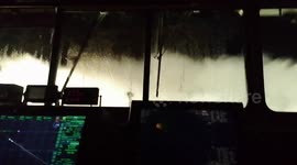 Waves smash violently against windows of cargo ship in North Atlantic
