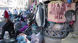 Hundreds of migrants in South Africa protest over relocation delays