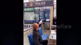 Commuter finishes bottle of Chinese liquor after he was not allowed to bring it onto train