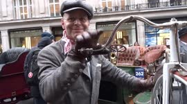 Swiss owner of penny farthing talks about his vintage vehicle at Regent Street Motor Show 2019