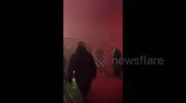 Wild scene as Ajax fans set off flares outside London hotel ahead of wild Champions League clash with Chelsea