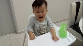 Toddler stops crying instantly when offered a donut