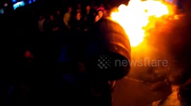 Brave locals carry flaming tar coated barrels through UK town in bizarre tradition