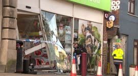 Ram-raid by thieves leaves Co-op store in south England smashed