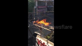 Longer look as Chilean students light trash on fire as protest continues