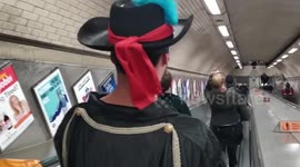Man swallows hotdogs on the tube