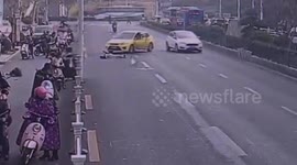 Chinese driver thrown out of car after pressing accelerator by mistake
