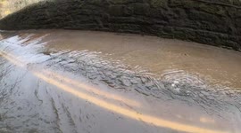Roads left submerged as flooding strikes towns across the Midlands A6 Matlock Bath