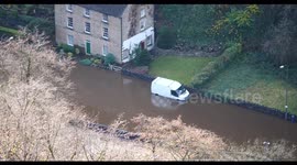 Roads left submerged as flooding strikes towns across the Midlands A6 Matlock Bath (4K High Resolution Video)