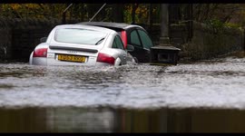 Audi TT car water damaged by the River Derwent flooding its banks Matlock Bath, Derbyshire, UK