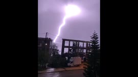 Spectacular moment lightning bolt strikes sea off coast of Greek island