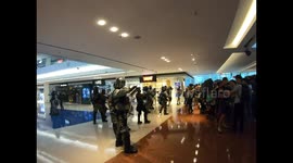 Chaos in Hong Kong as riot police use pepper spray inside shopping mall