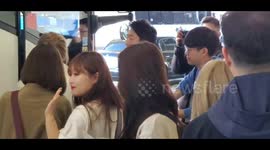 K-pop act Lovelyz mingle with fans at LAX airport