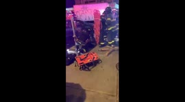 NYPD and FDNY rescue woman pinned underneath stole car part1