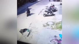 Scooter rider in 'bad mood' kicks random elderly man to the ground in China