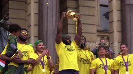 Rugby World Cup winners welcomed home by thousands on the streets of Cape Town