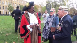 The Mayor of Southwark Sandra Rhule and Royal Navy veteran Ernie Davies are leaving the Soviet War Memorial at the end of Act of Remembrance 2019 - London