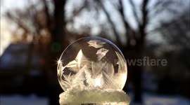 Frosty weather in Canada freezes soap bubble solid in mesmerising video