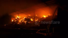 Hay barn catches fire in extended blaze at Israeli farm