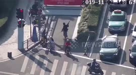Chinese man cycles backwards along busy road without touching handlebars