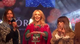 FILE: Kylie Minogue switches Christmas lights on Oxford Street in London in 2015
