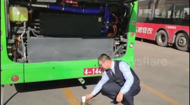 Chinese motorist drinks water from exhaust of hydrogen-powered bus to show how clean it is