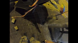 Hong Kong Protesters attack Mongkok police station and pull back after a protester is injured by rubber bullets